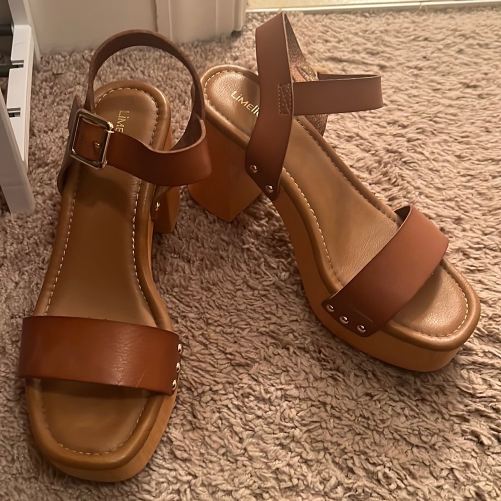 Brand new platform heeled sandals